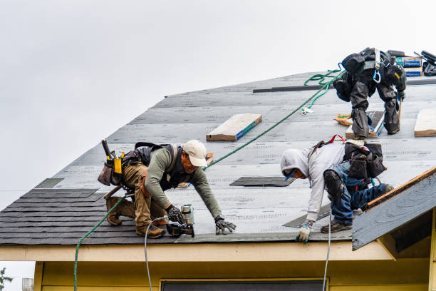 Professional Roofing technician working in Waelder, TX